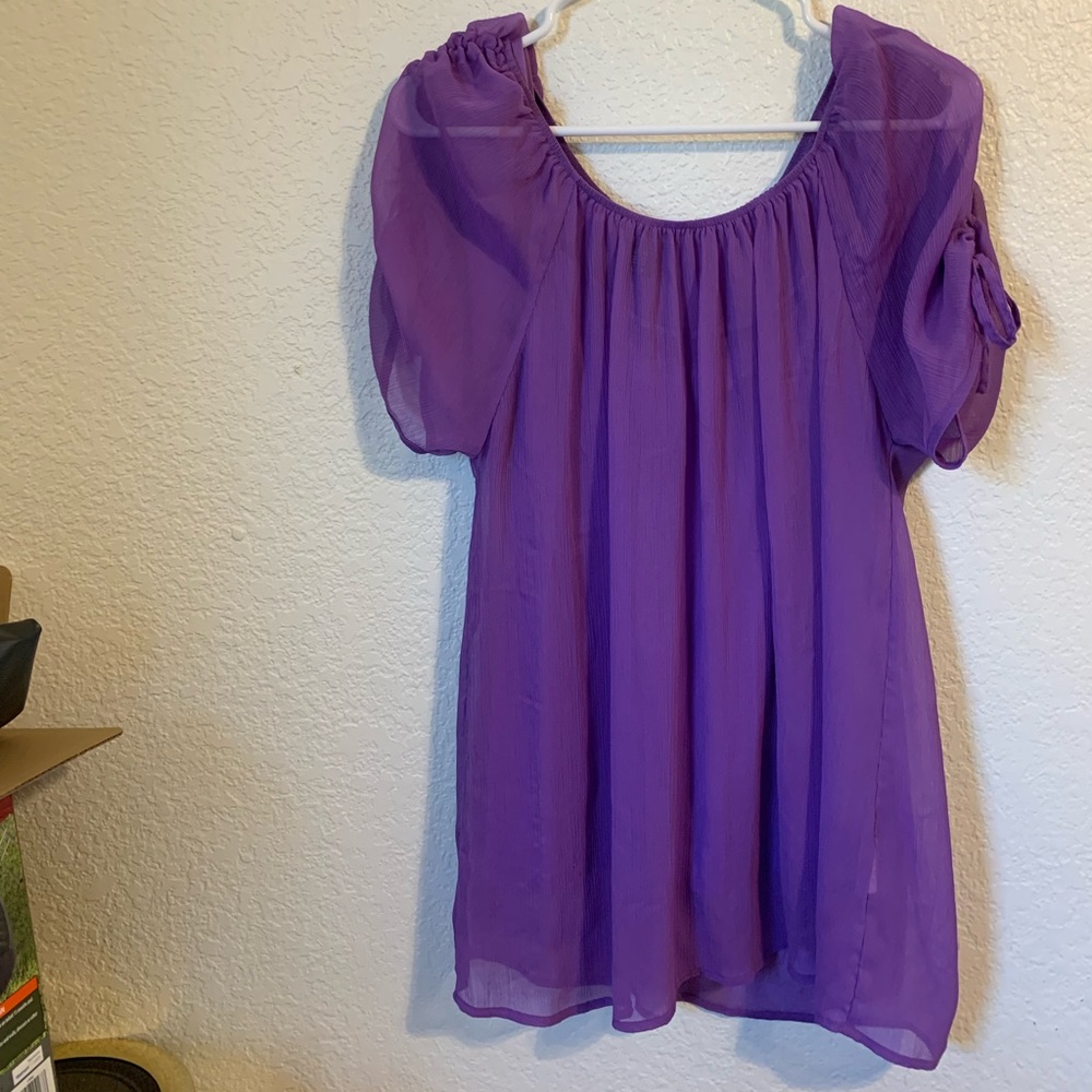 This is a beautiful purple summer blouse XL. 2 pieces